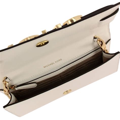 michael kors foldover clutch|michael kors women's white clutch.